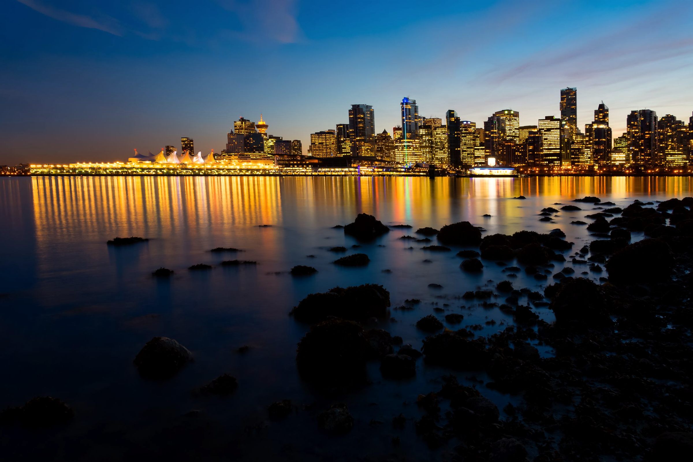Vancouver skyline across the water at blue hour